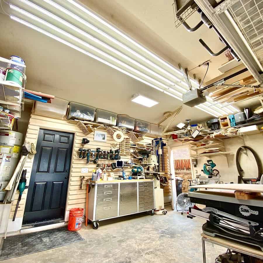 Bright and organized garage workshop with multiple tools