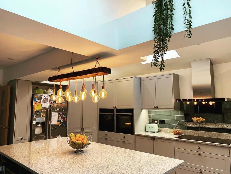 small kitchen with pendant lamps