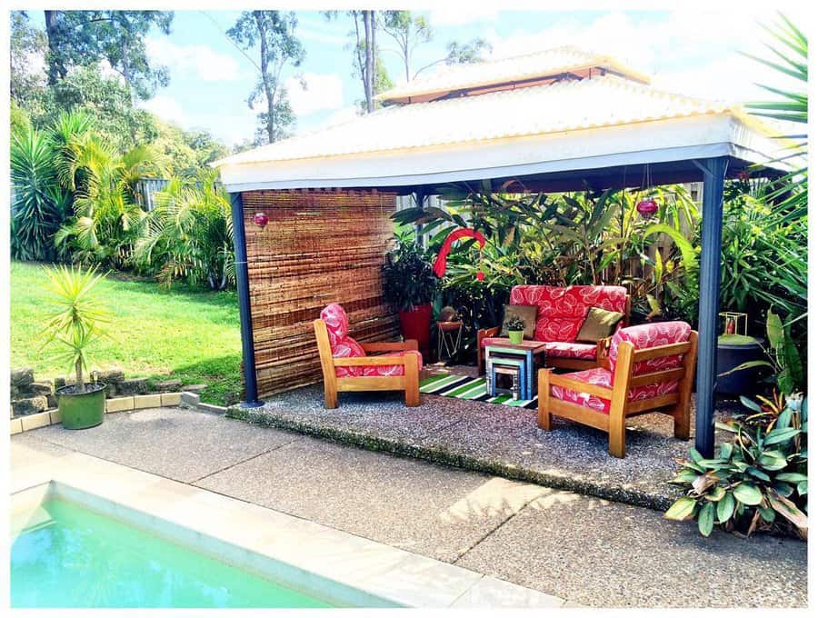 Cozy tropical poolside lounge area