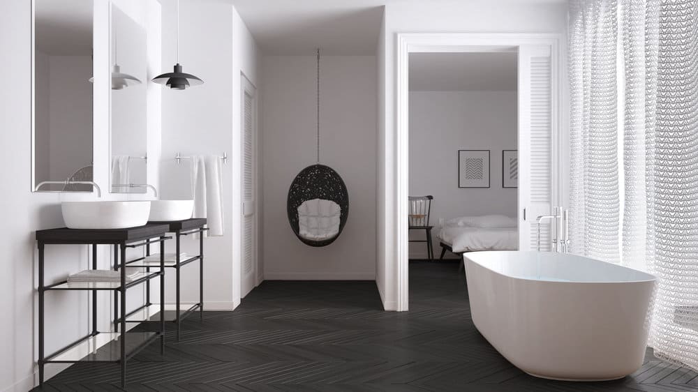 black and white bathroom with white and black flooring