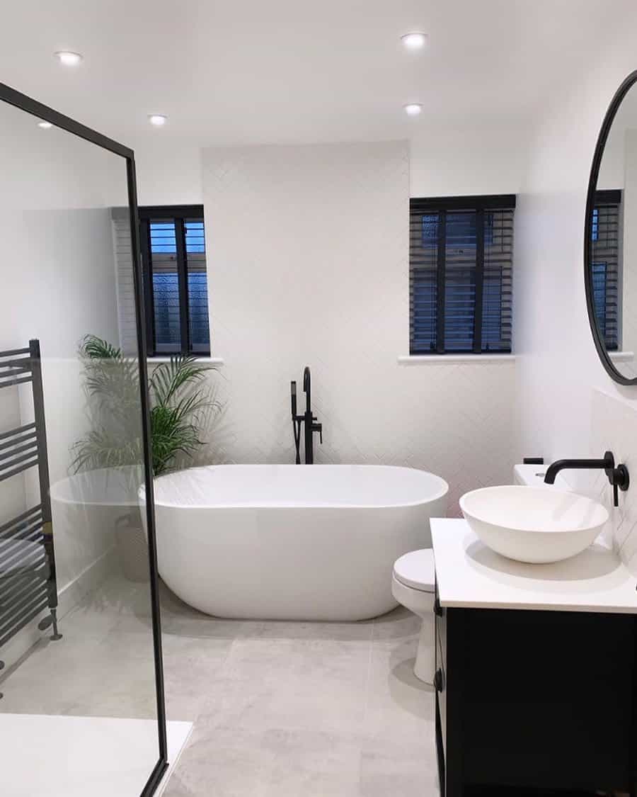 black and white bathroom with matte black fixtures