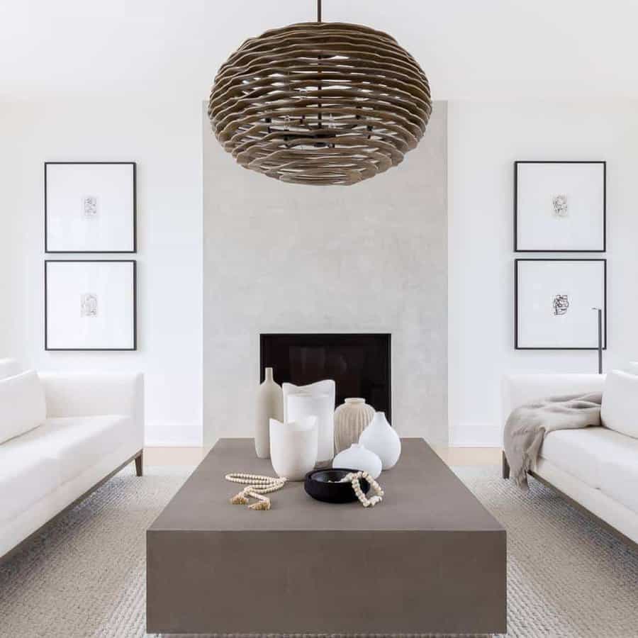 white living room with statement lamp 