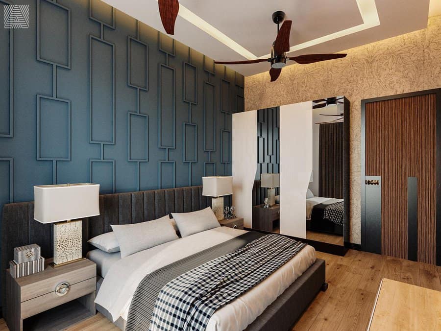 Chic bedroom with patterned blue accent wall and modern decor