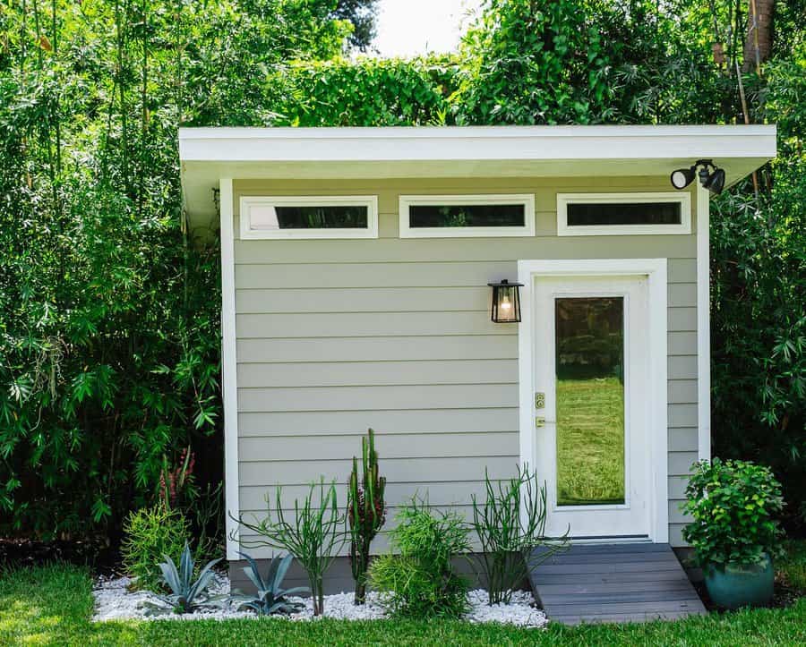 Garden shed with wall cladding