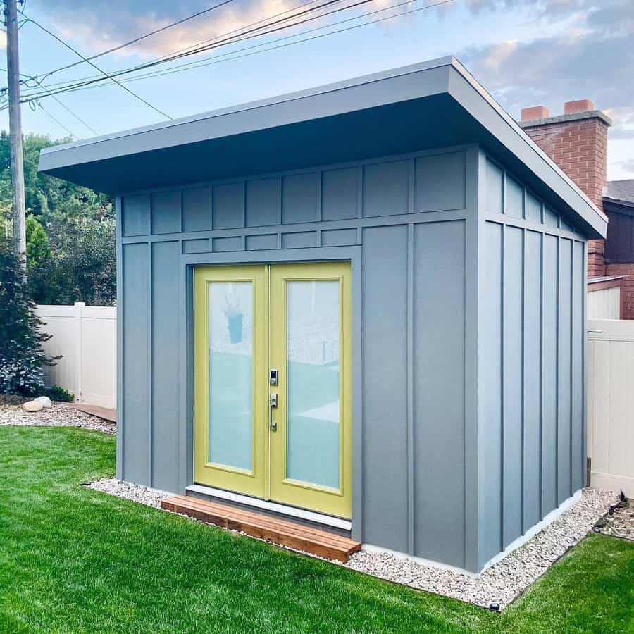 Blue and yellow garden shed 