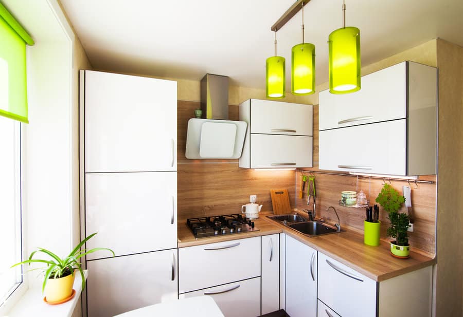 Sleek kitchen with green accent