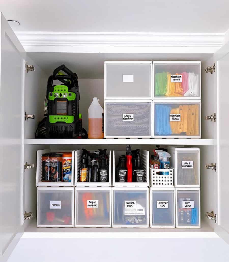 Cabinet with neatly labeled storage bins and cleaning tools