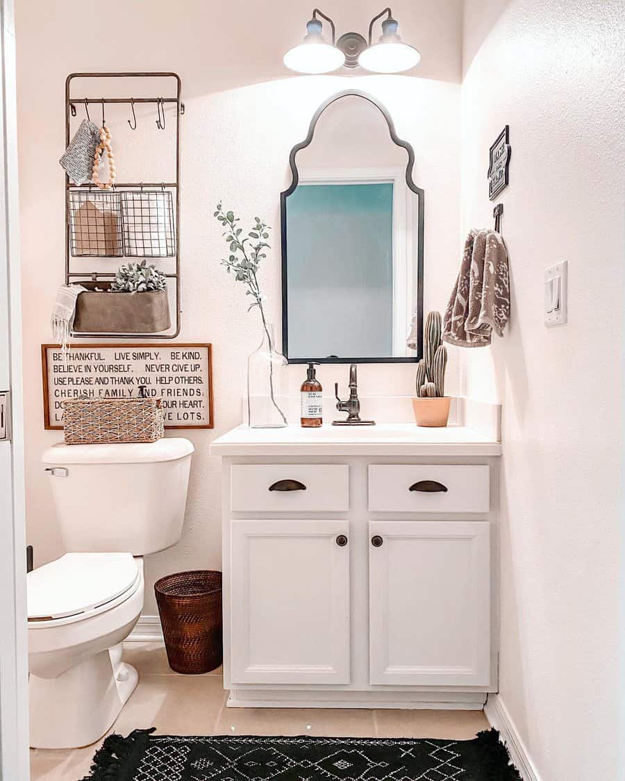 Small bathroom with light pink walls