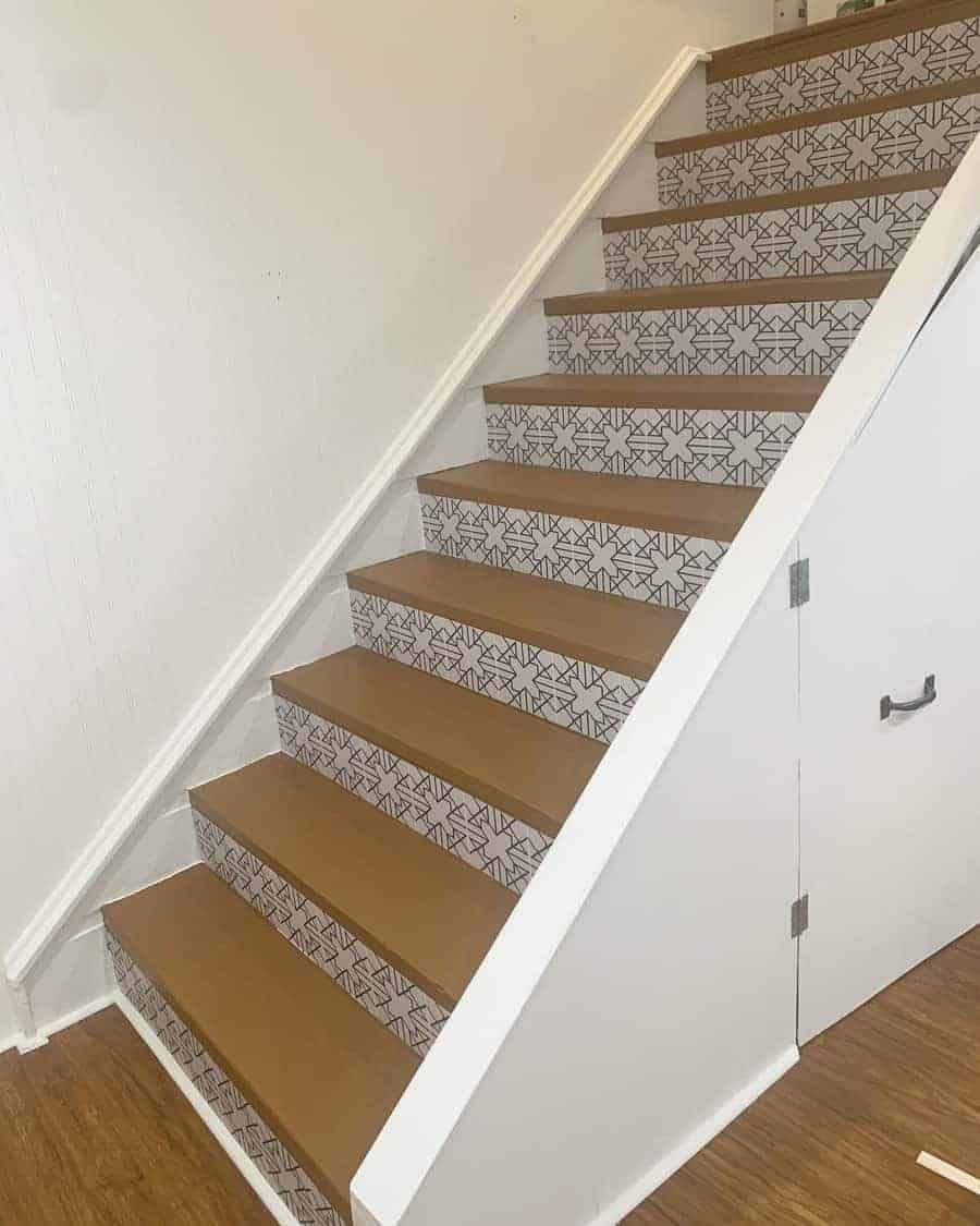 Uniquely patterned stairs with white wall 