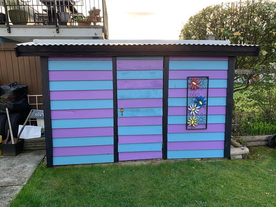 Garden shed with wall art