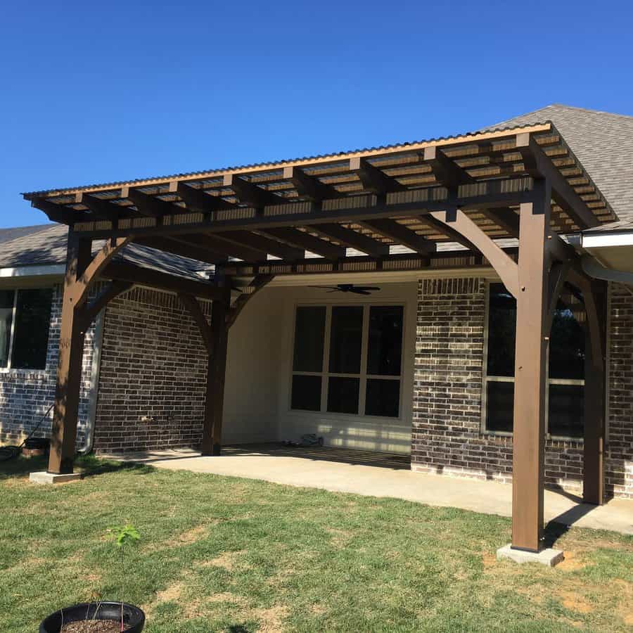 Backyard pergola with lawn