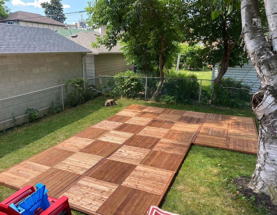 floating deck with wood checkerboard flooring