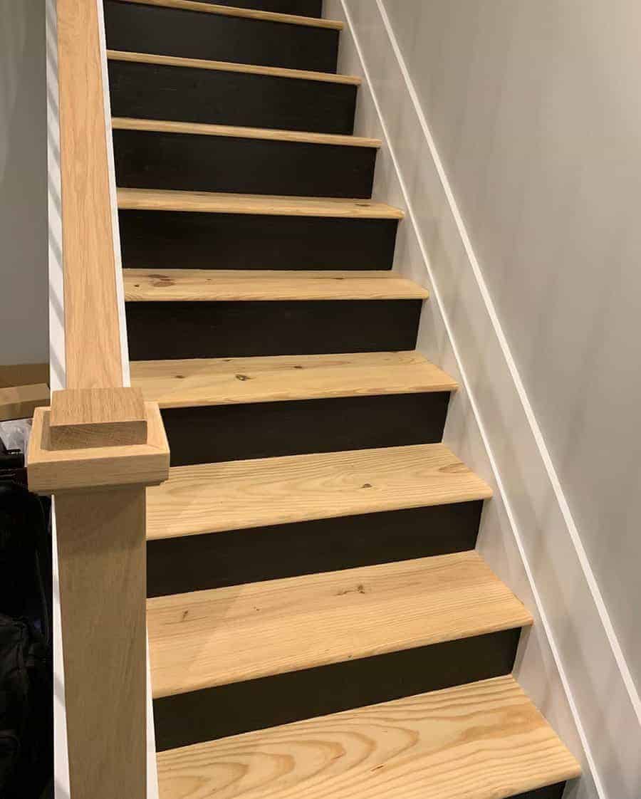 A monochrome staircase with contrasting black and white paint