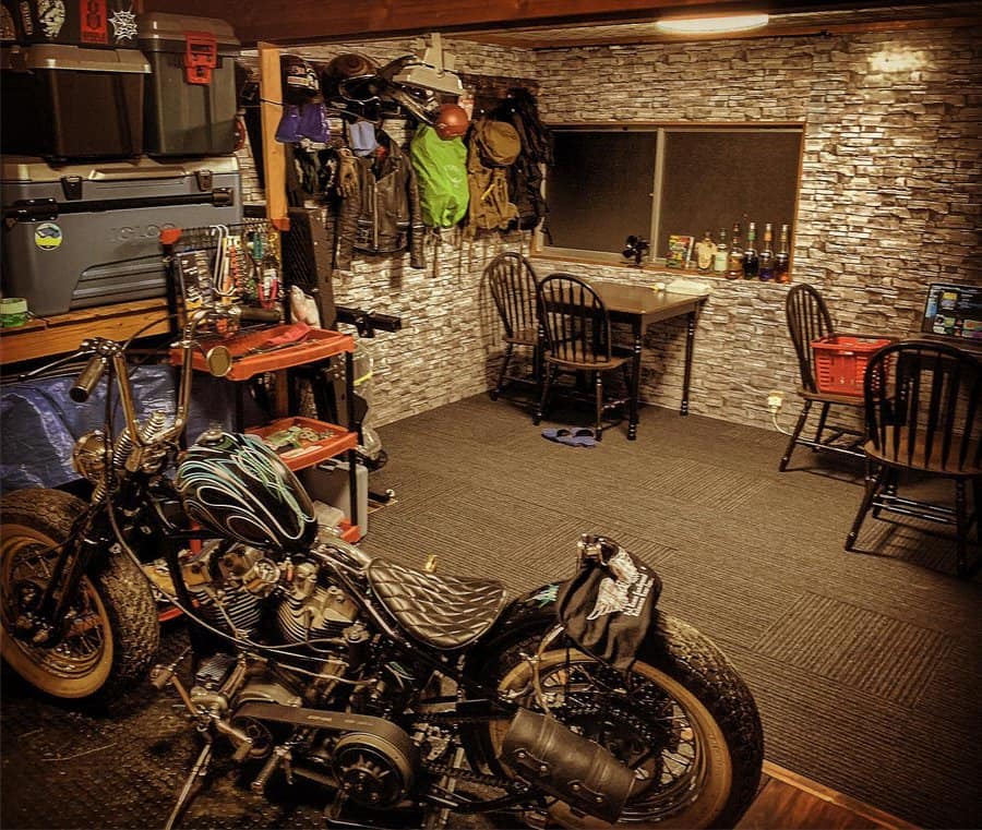 Cozy garage space with motorcycle and brick wall accents