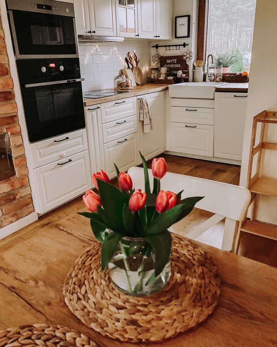 small kitchen with fresh flowers