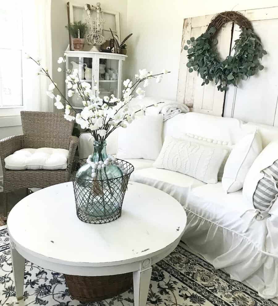 white living room with dried flowers 