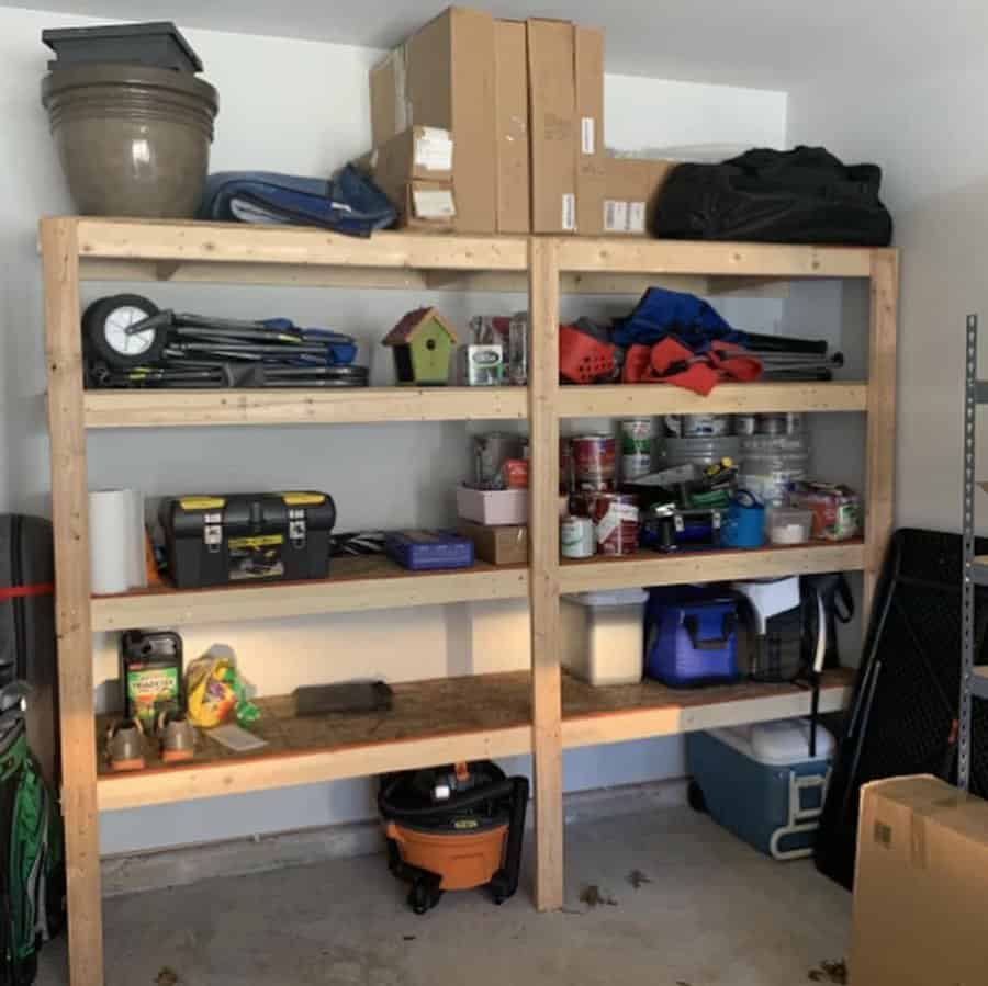 A garage with shelves and tools neatly organized