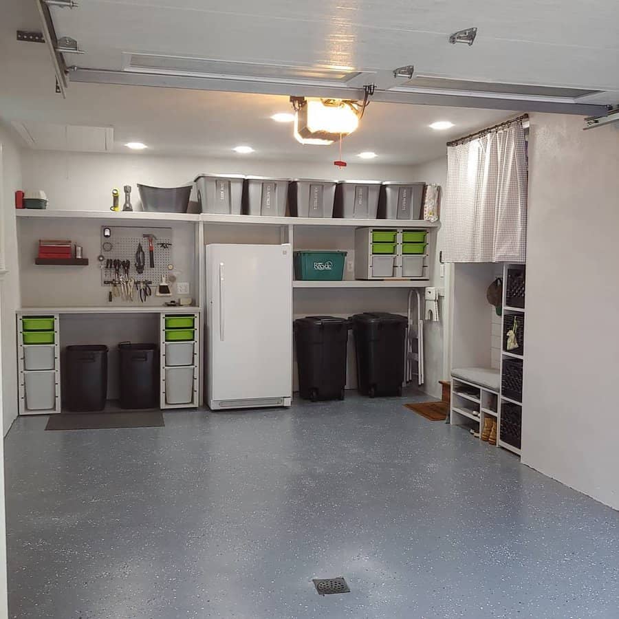 Neatly organized garage with wooden shelves and plastic containers