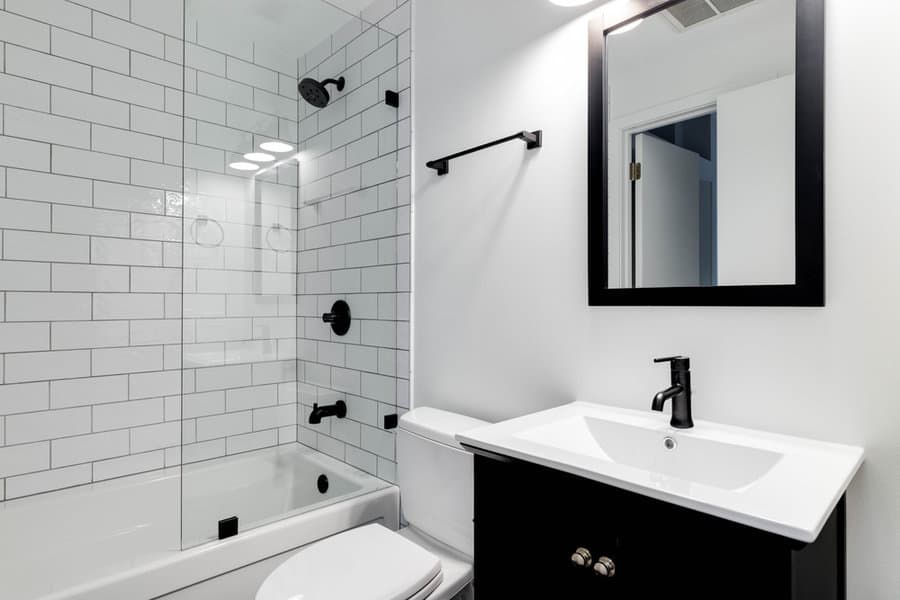 Black framed bathroom mirror