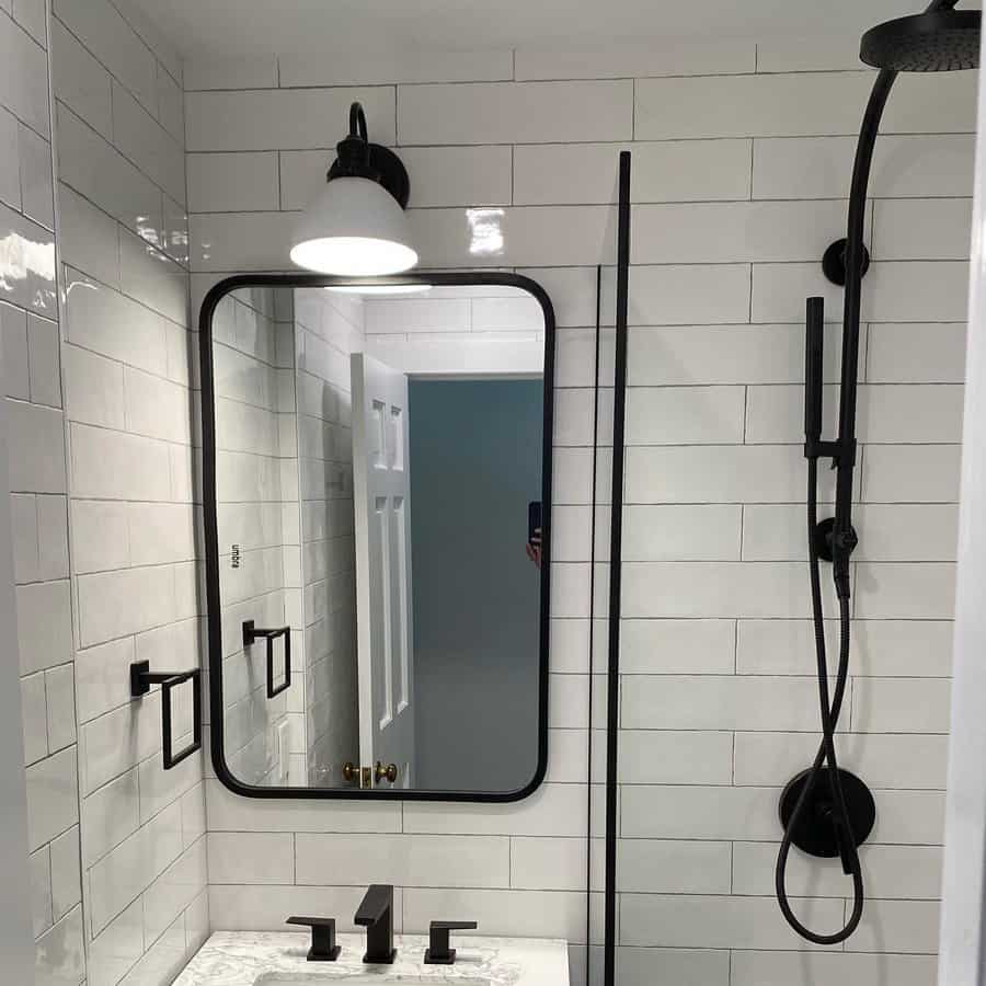 Black framed bathroom mirror