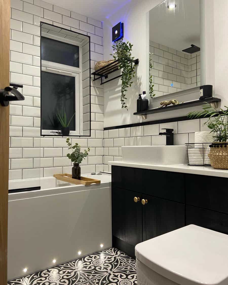 black and white bathroom with subway tiles 