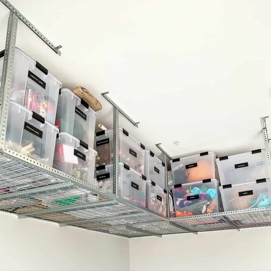 Neatly organized plastic containers in the overhead garage storage rack