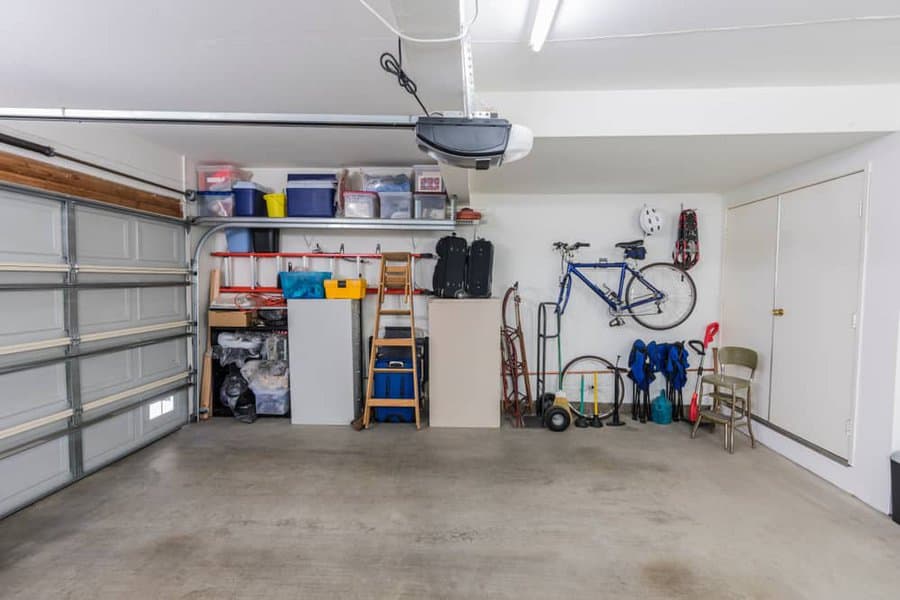 Garage interior with a bicycle and miscellaneous items