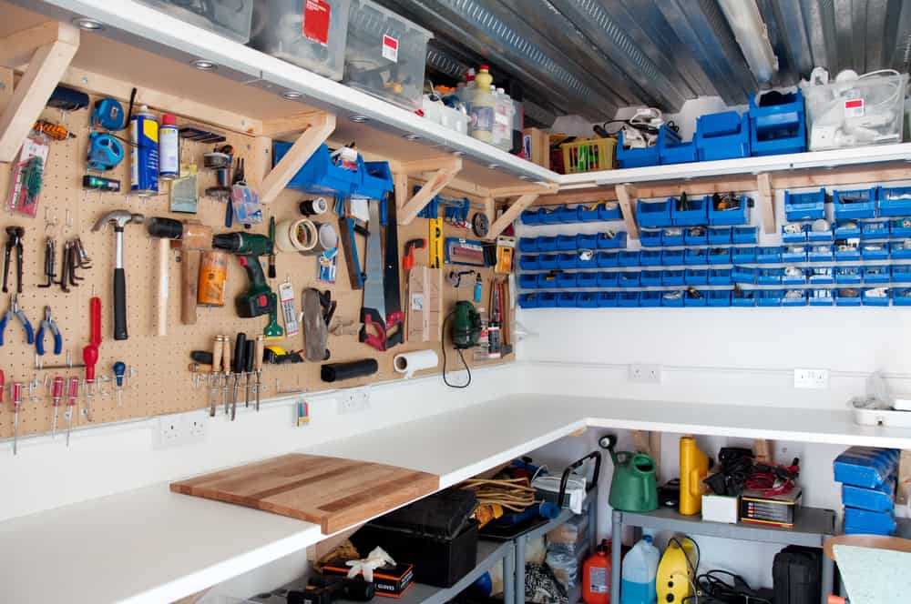 Organized garage with tools neatly arranged on shelves