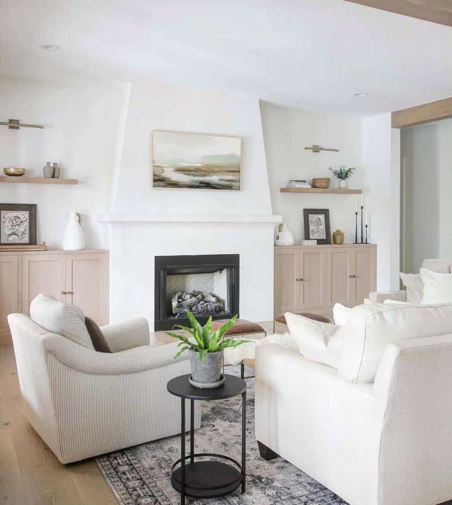 White living room with natural toned cabinets