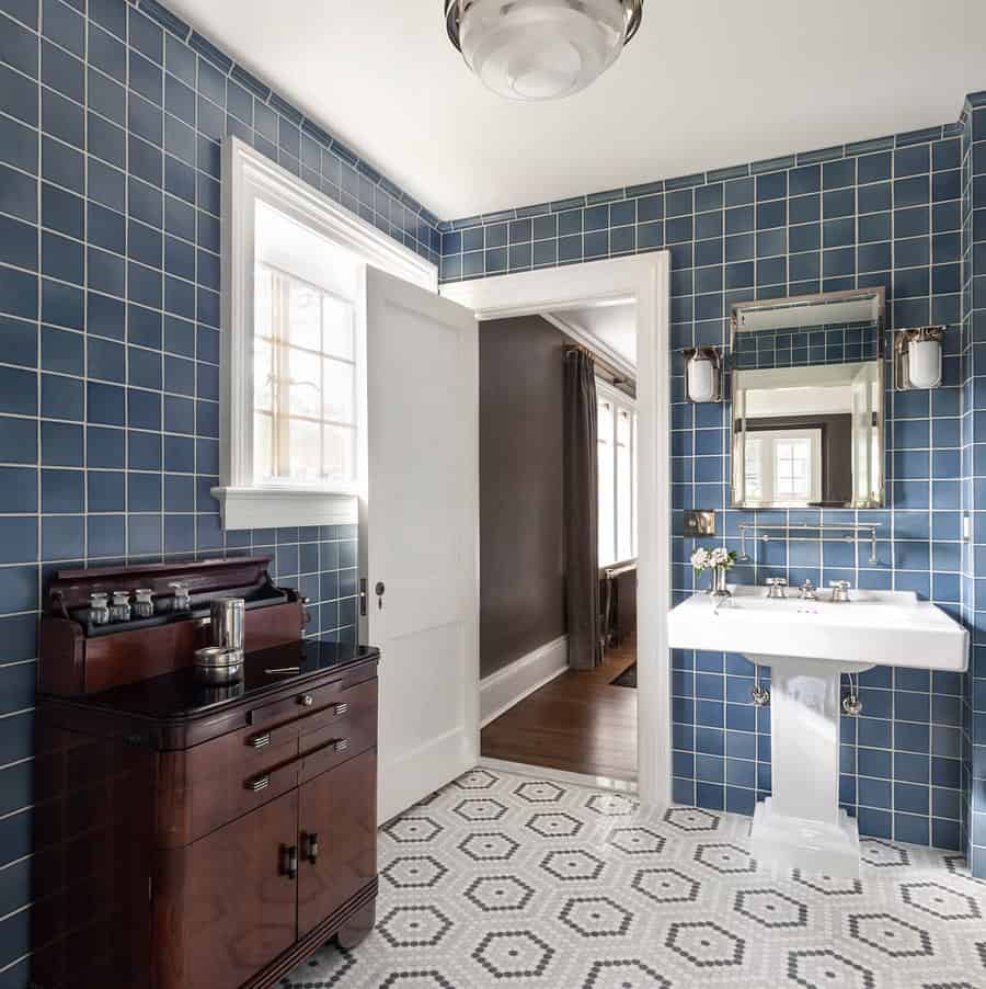 Blue bathroom with vintage cabinet