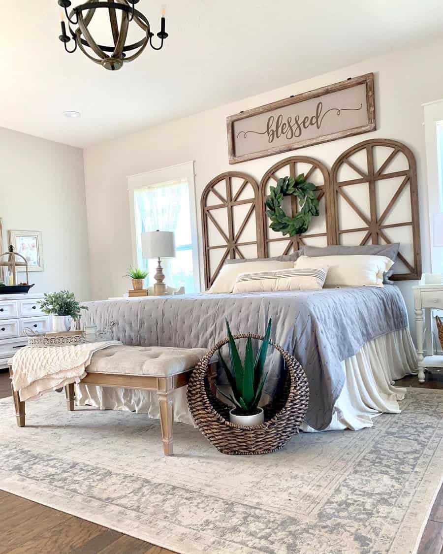 Serene bedroom with 'blessed' sign and cathedral window frames