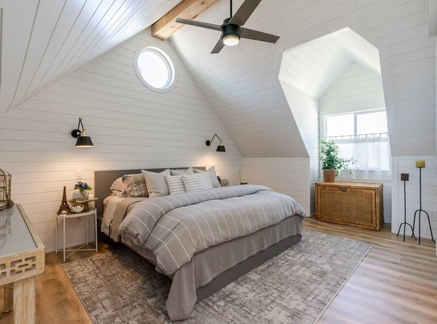 Attic bedroom with glass windows 