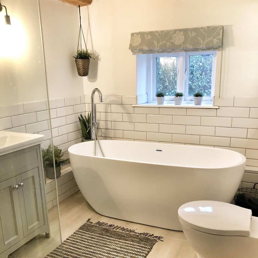 small bathroom with fun rugs