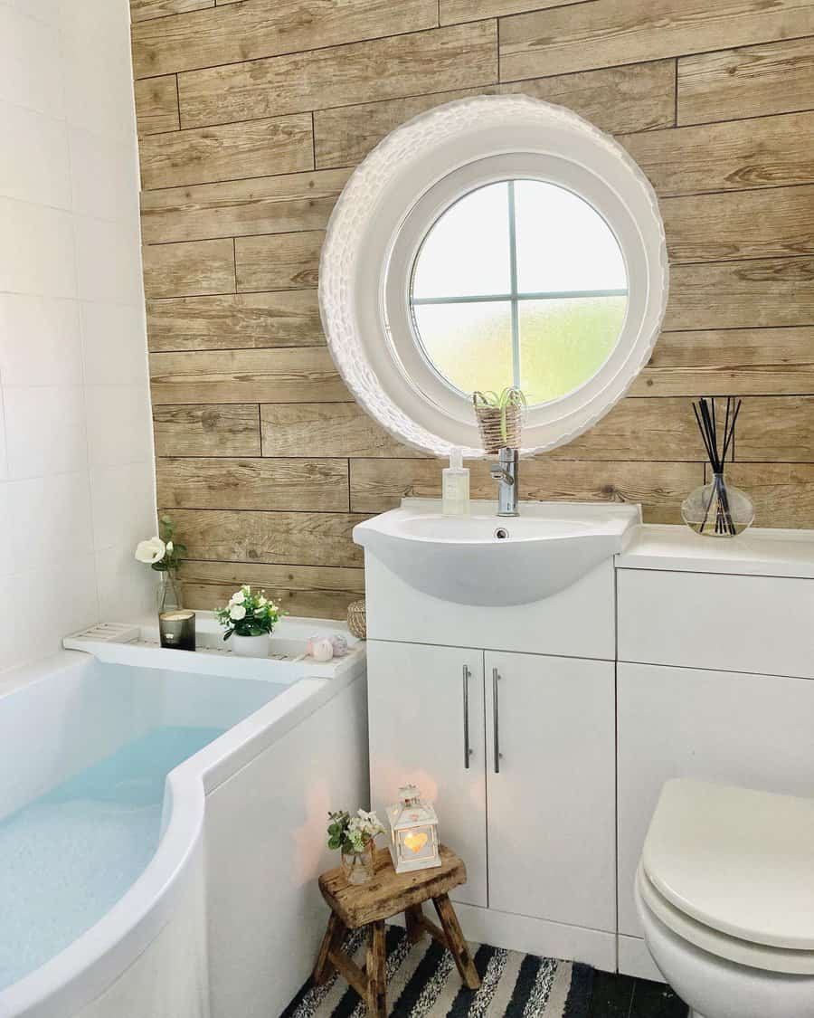 small bathroom with round window