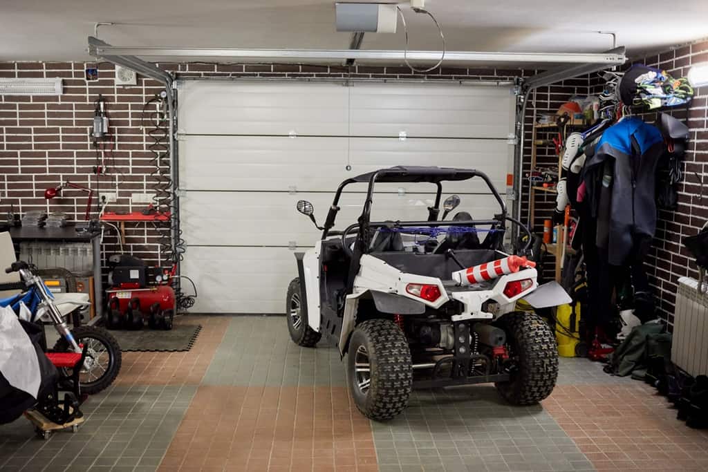 Garage with ATV and storage