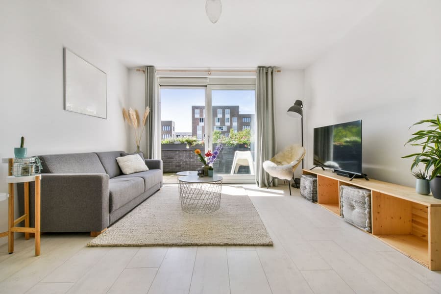 Living room with a sofa and DIY crate TV stand