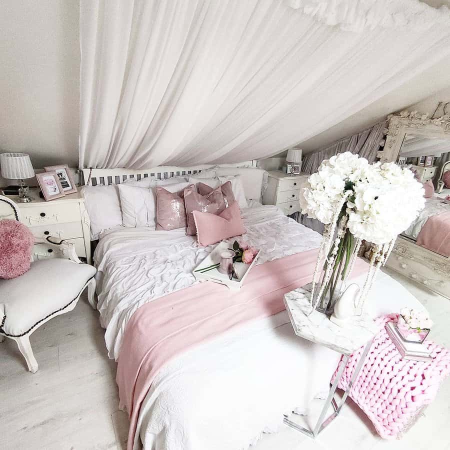 Shabby chic bedroom with pink accents and flowers