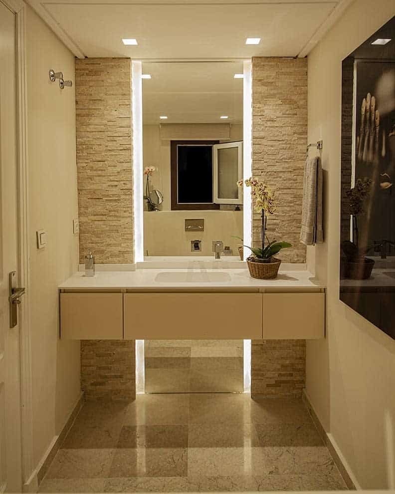 Rustic stone cladded bathroom wall