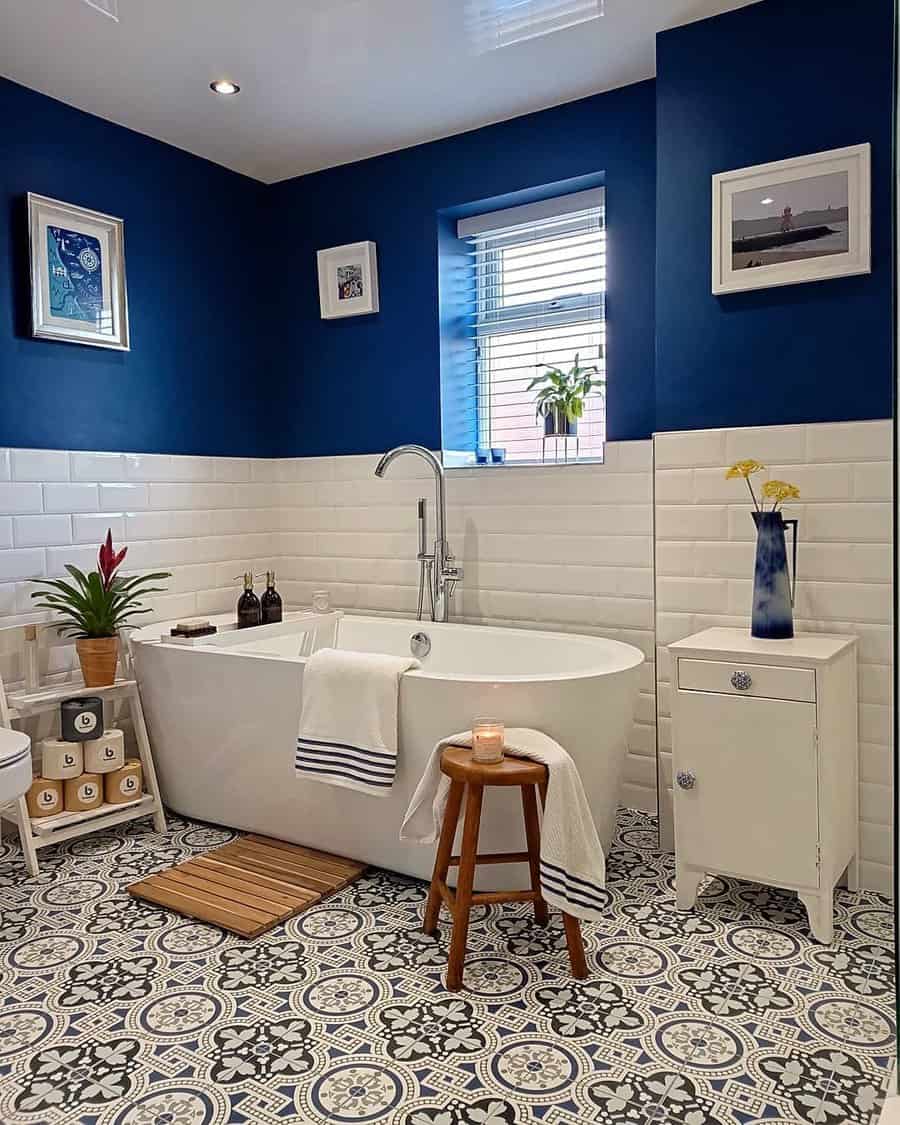 Nautical themed framed pictures in a bathroom