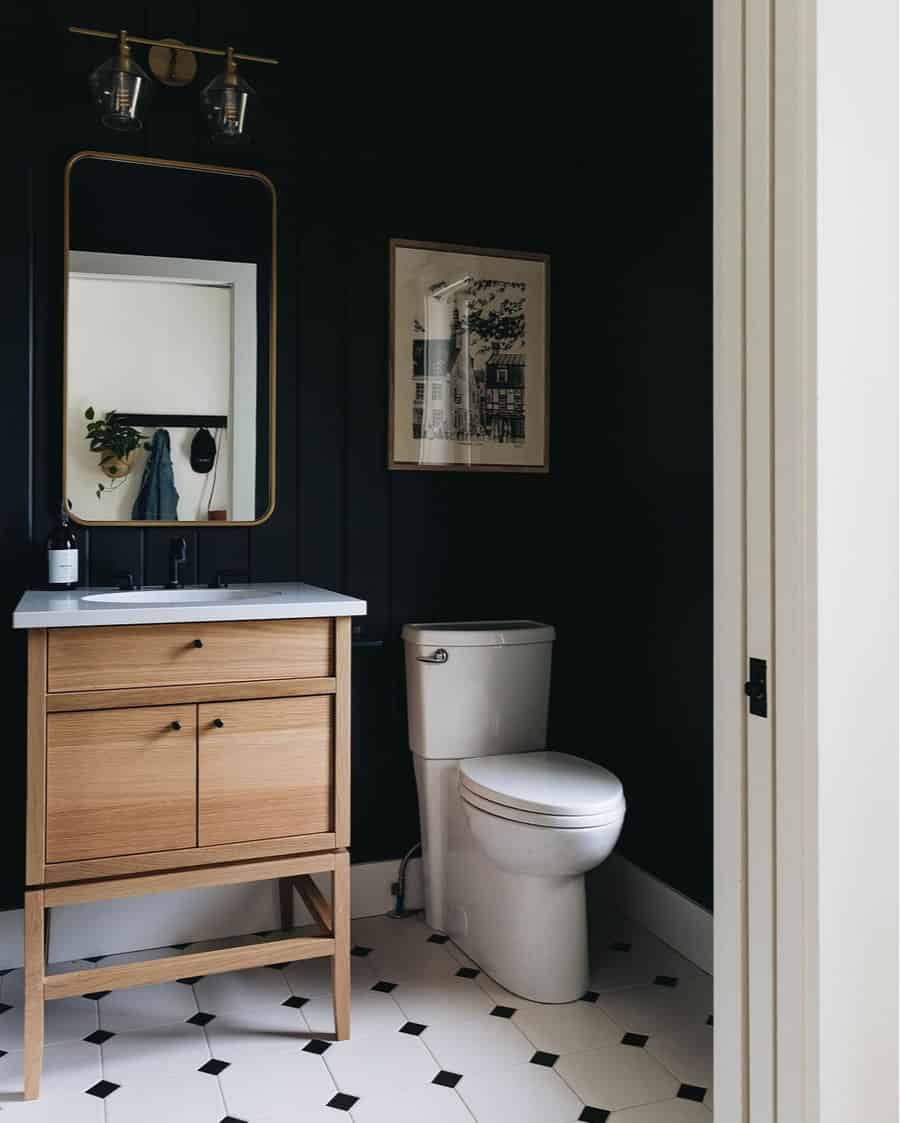 powder room with wall sconces