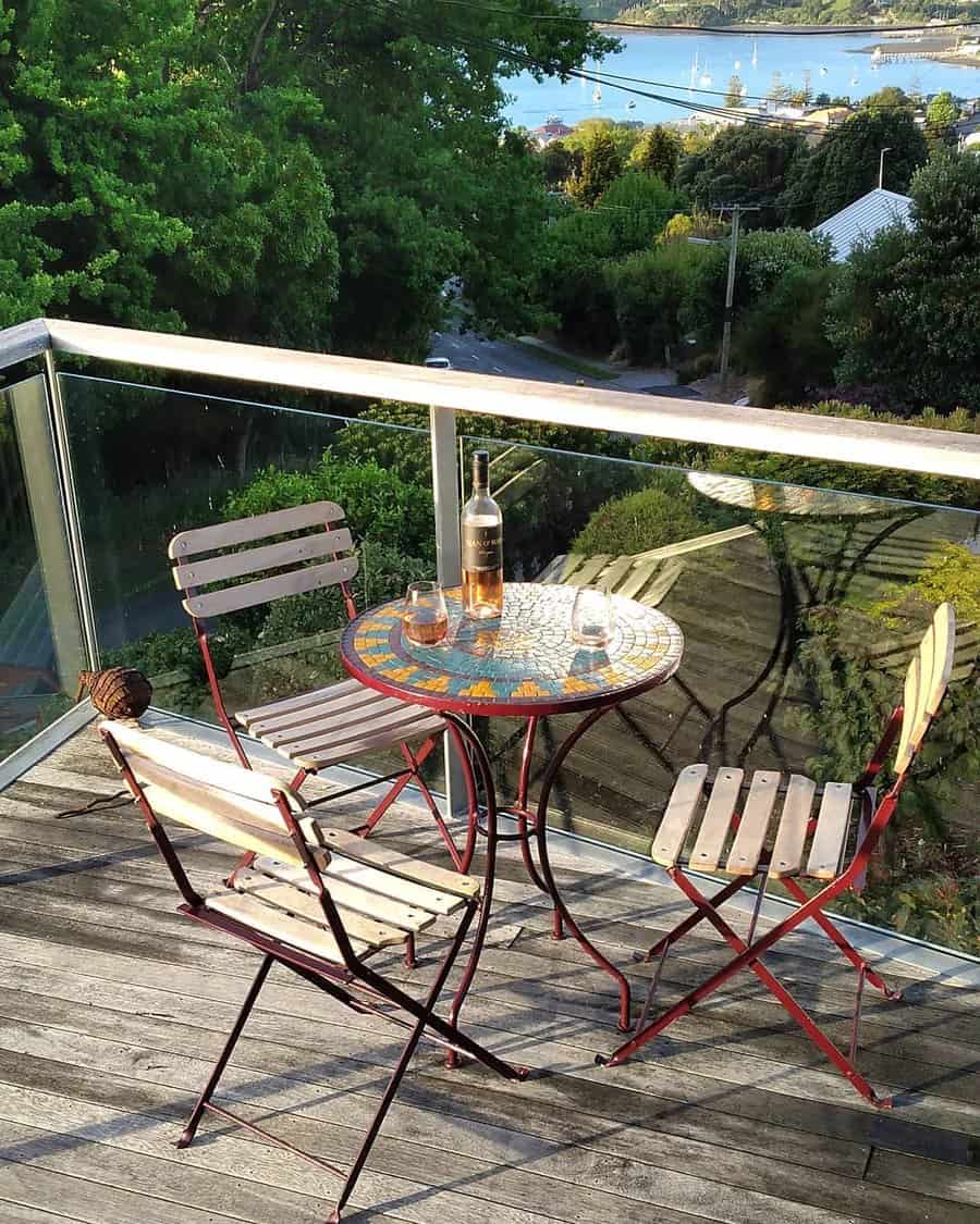 backyard deck with glass fence