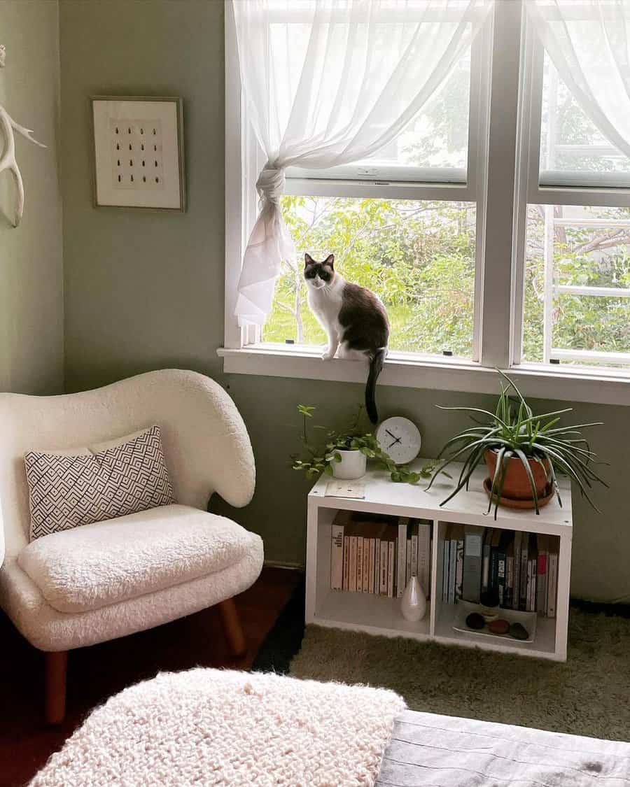 White reading nook chair in a corner of house