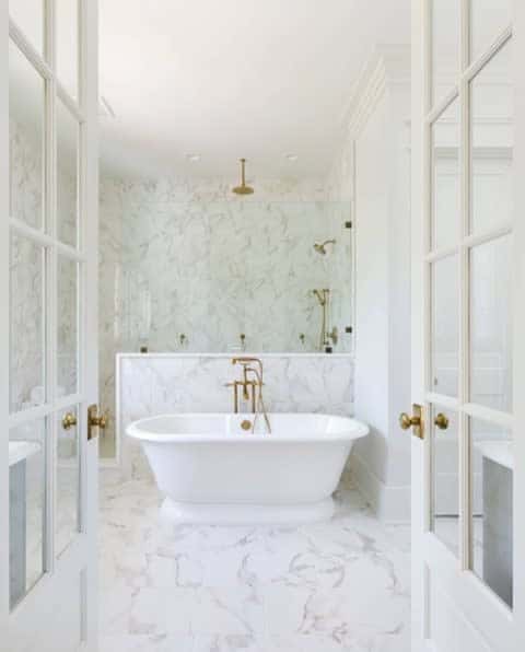 marble-tiled bathroom wall