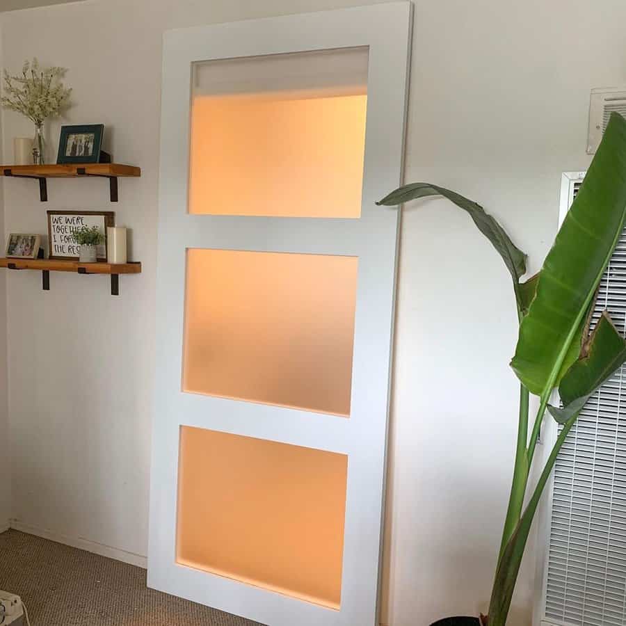 Framed glass barn door