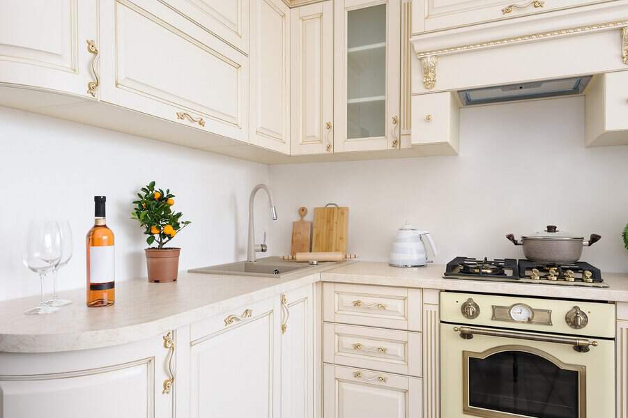 vintage-style white kitchen cabinets