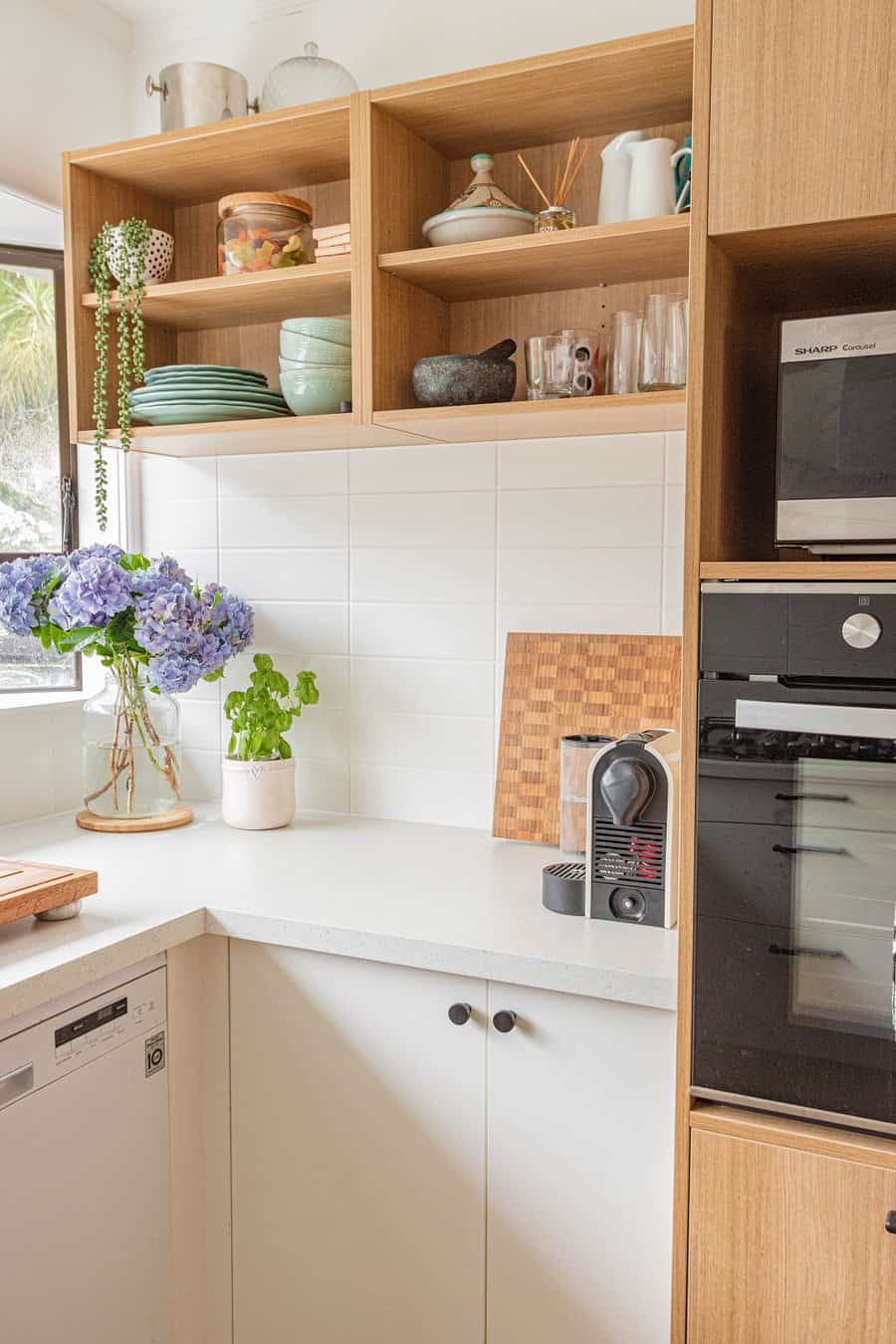 white cabinets with wood shelves