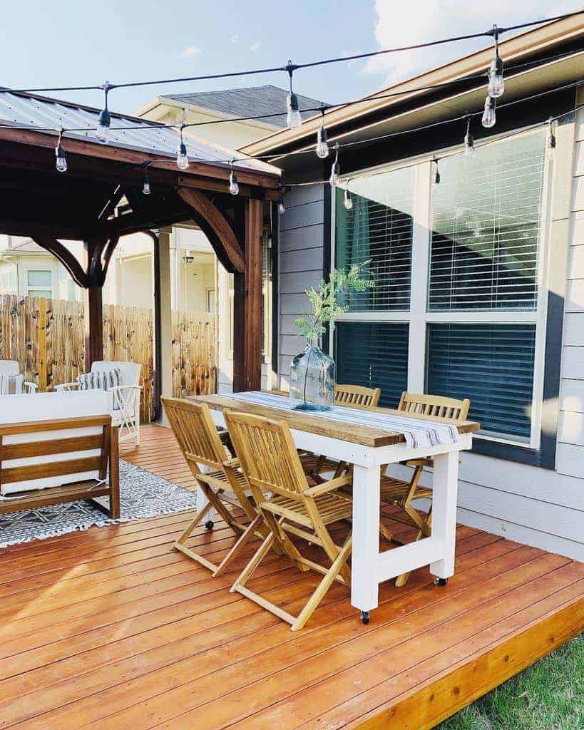 Backyard deck with string lights