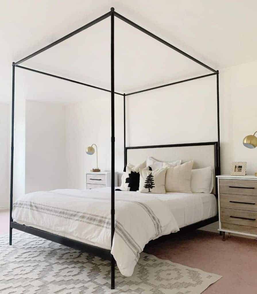 Black Canopy Bed in white bedroom