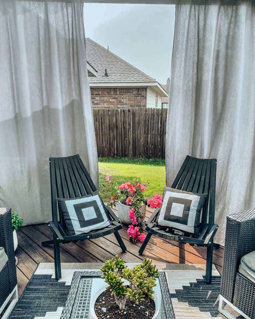 Backyard deck with curtains