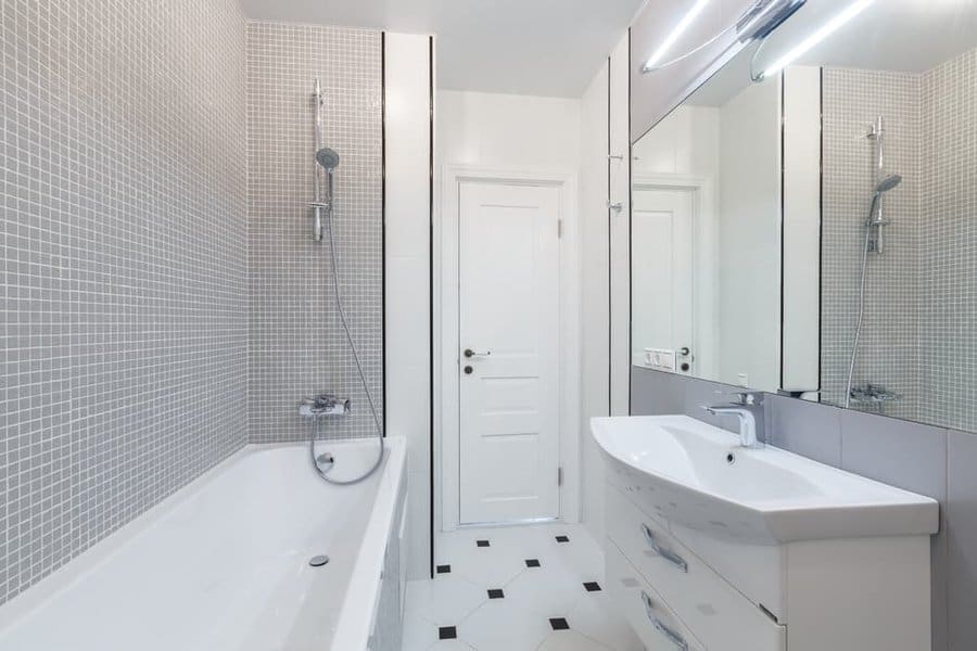 full bathroom with tub 11